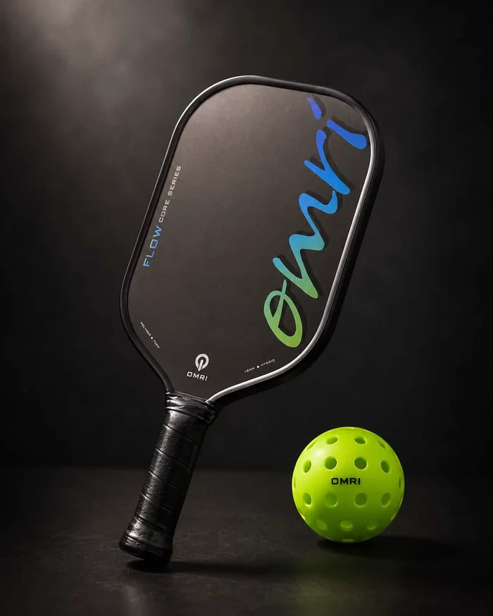 OMRI FLOW OCEAN pickleball paddle with ball, studio shot